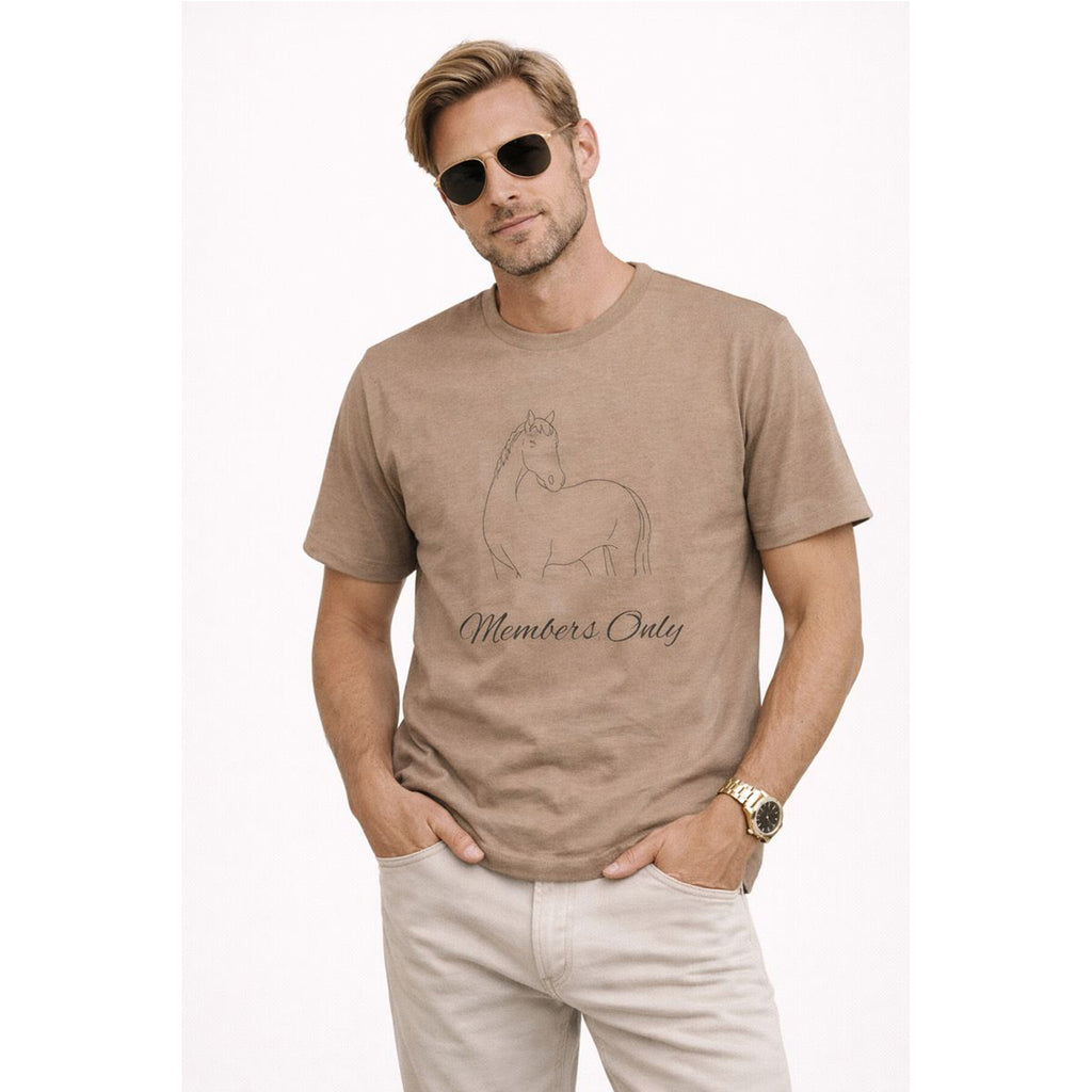 Man wearing a brown t-shirt with a graphic design and text, standing against a white background