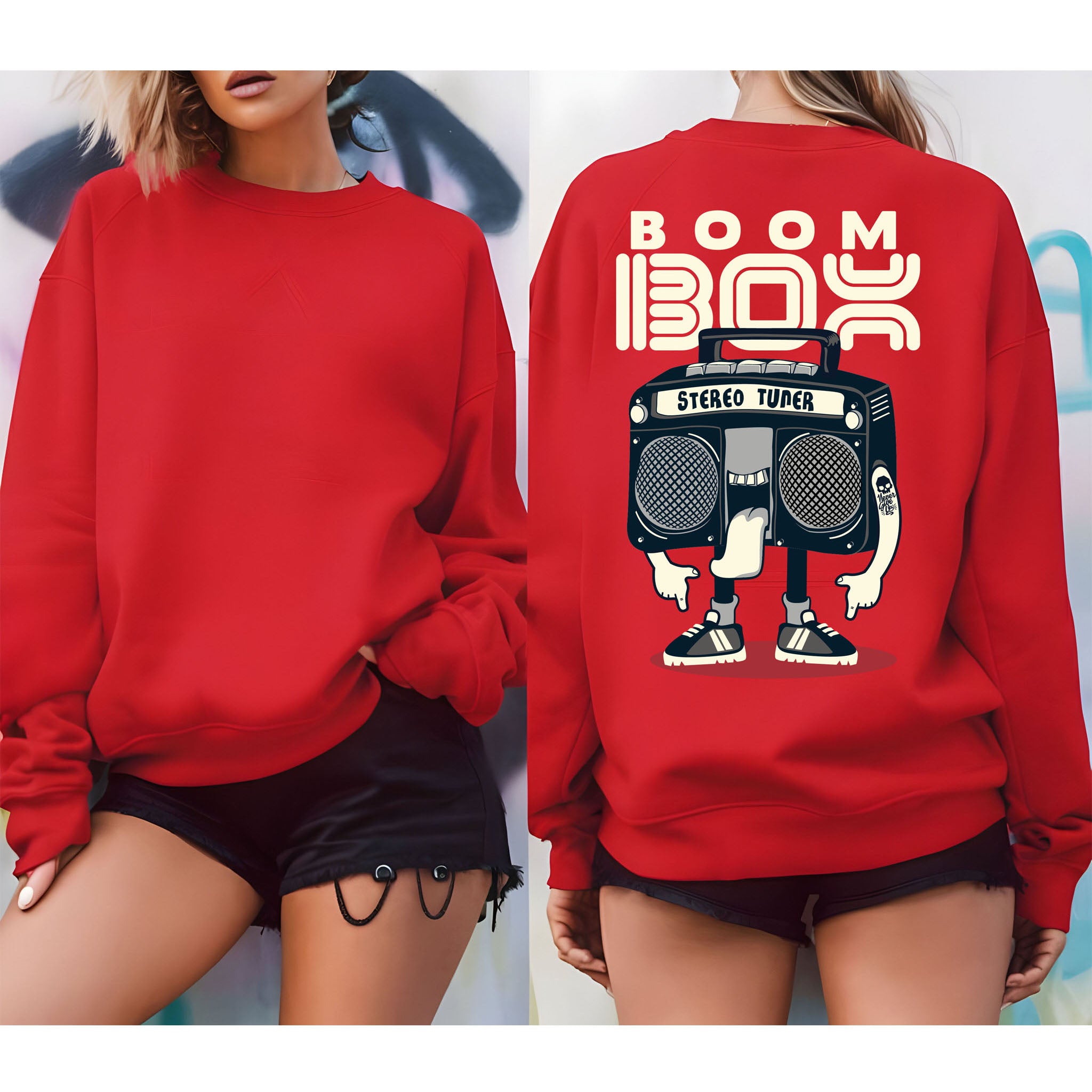 Red sweatshirt with 'Boom Boy' graphic on the back, worn by a person.