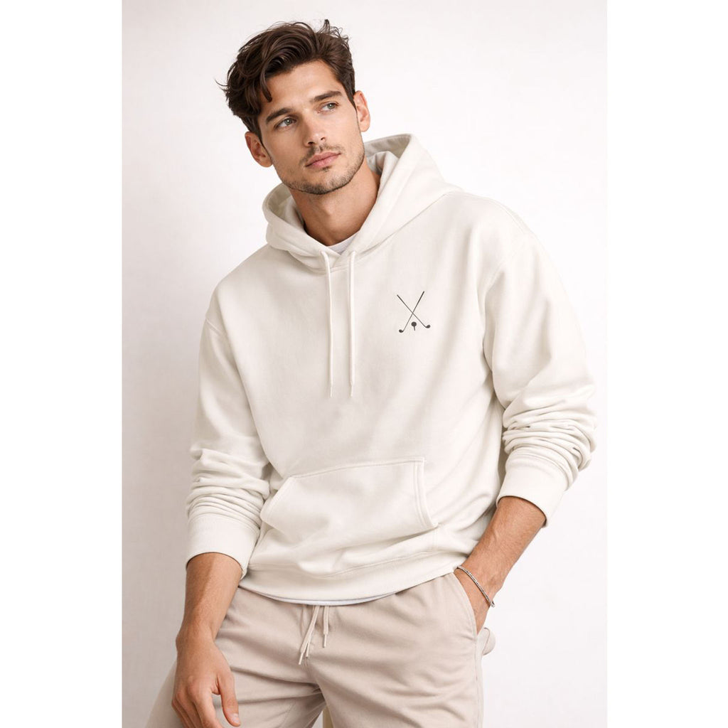 Man wearing a white hoodie with a logo on a plain background