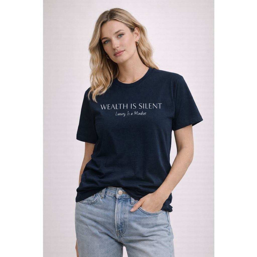 Woman wearing a navy blue t-shirt with text on a plain background