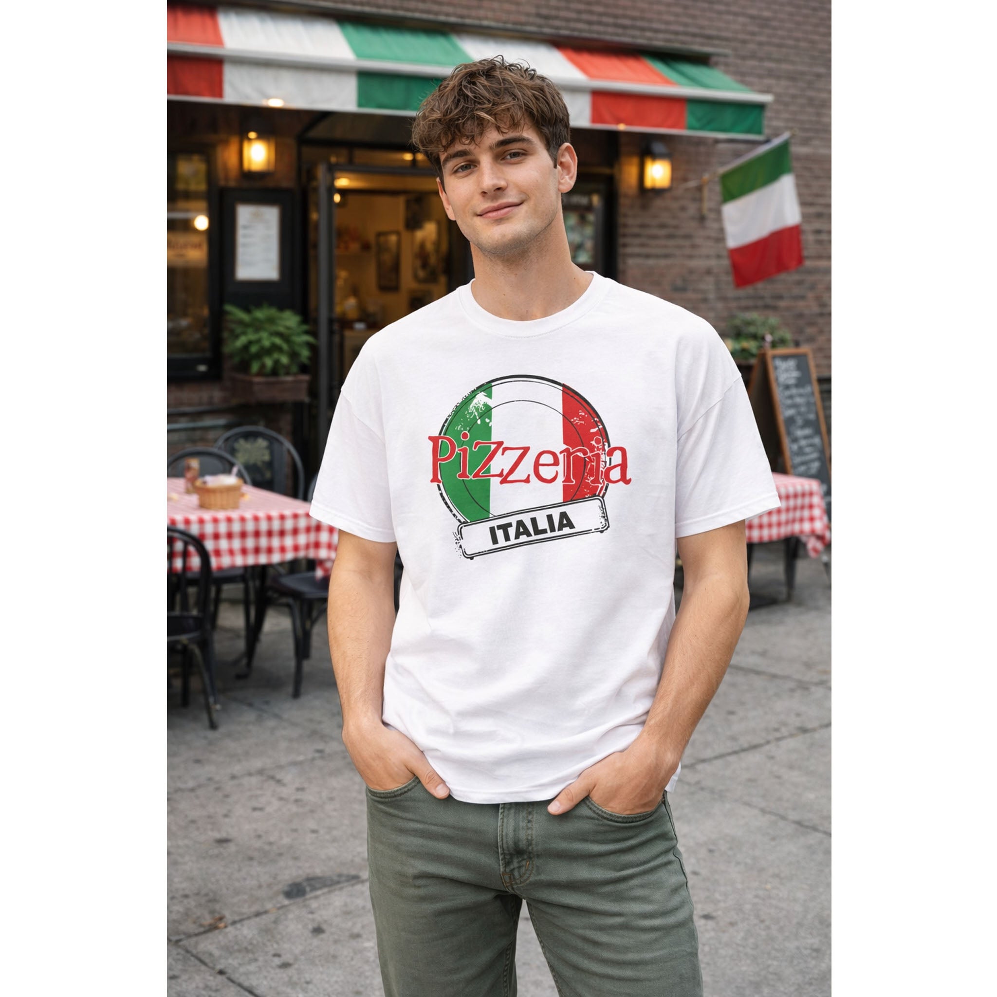 Man wearing a white t-shirt with 'Pizzeria Italia' design in an Italian-themed outdoor setting – Bamerix