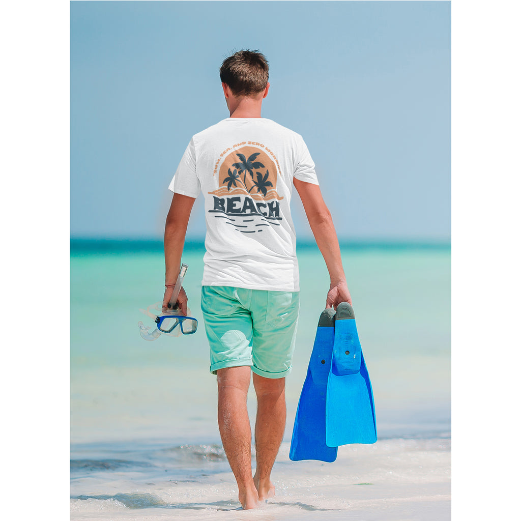 Man walking on a beach with a 'Beach' t-shirt and blue flippers.