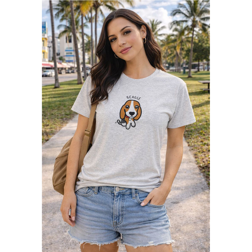 Woman wearing a gray t-shirt with a beagle graphic in an outdoor setting with palm trees.