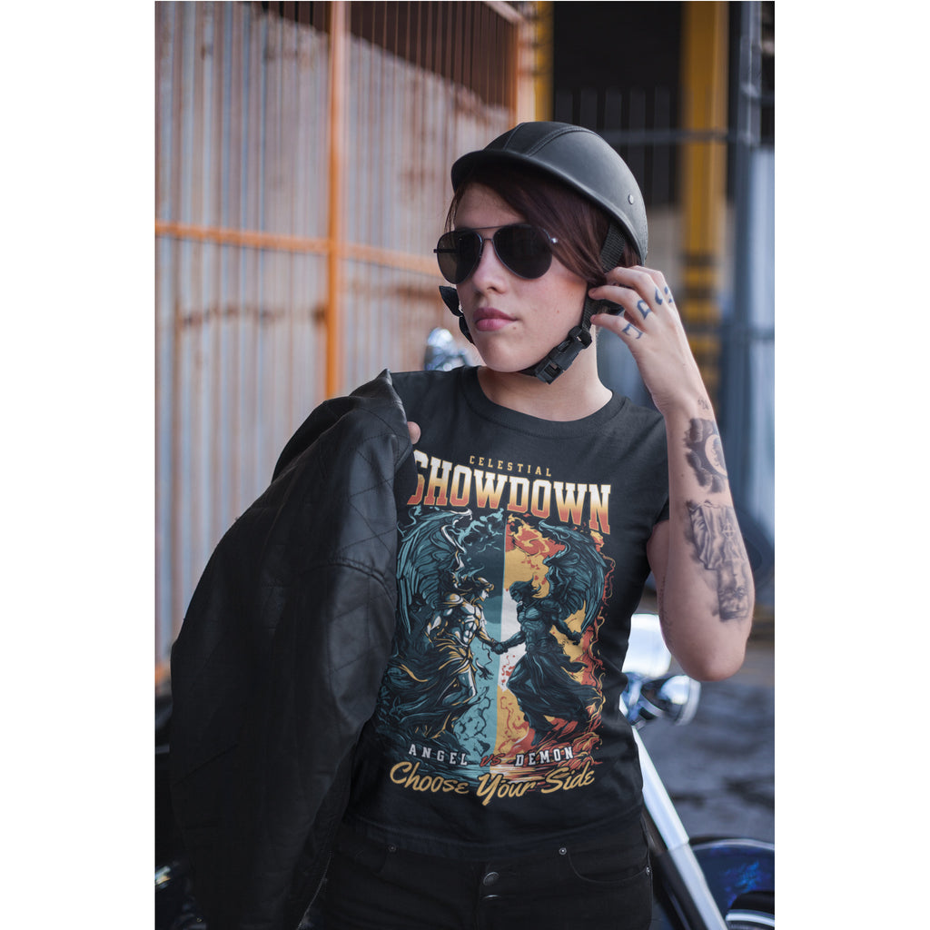 Person wearing a graphic t-shirt with a design and text, standing outdoors.