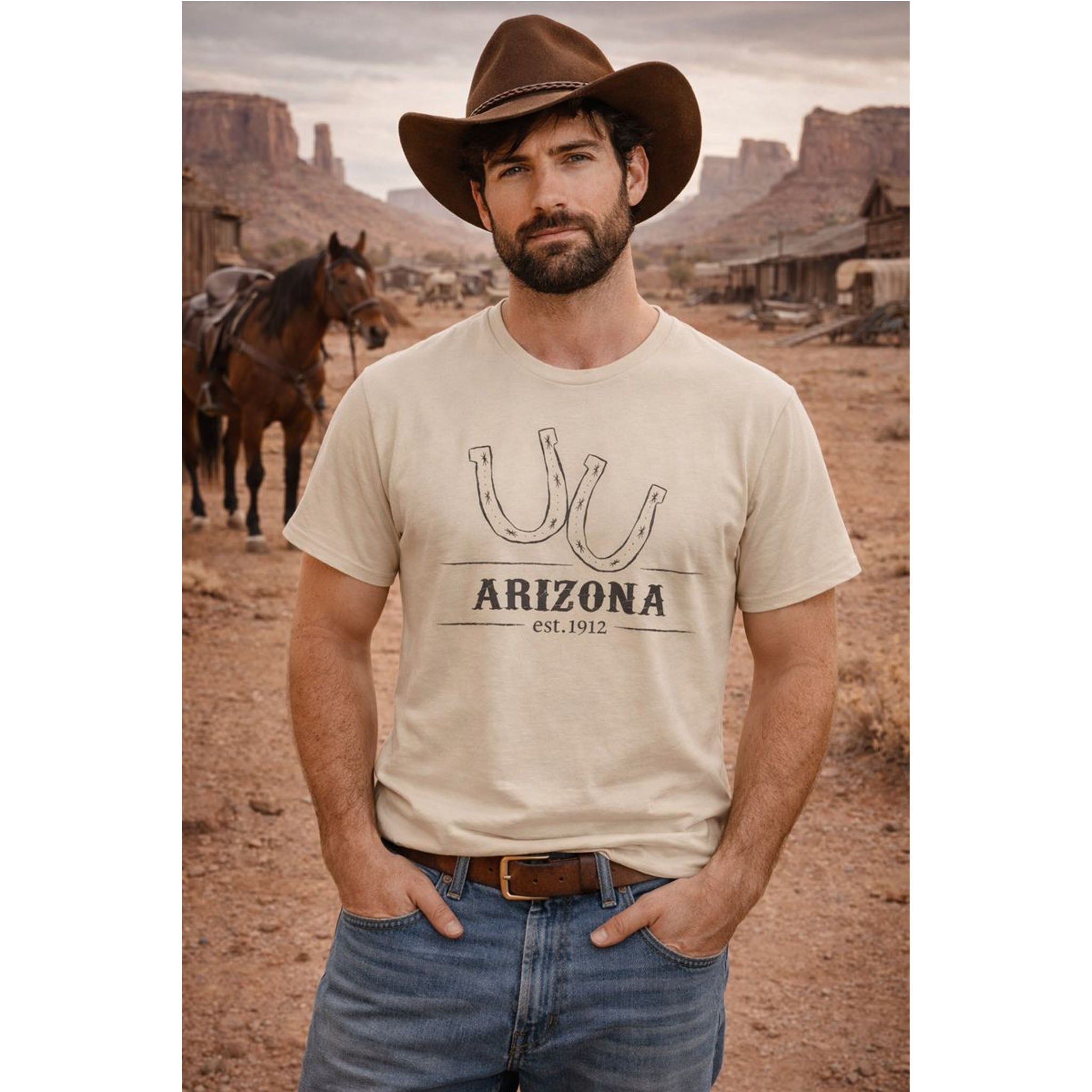 Man wearing a 'Arizona' t-shirt in a desert setting with a horse and rustic buildings.