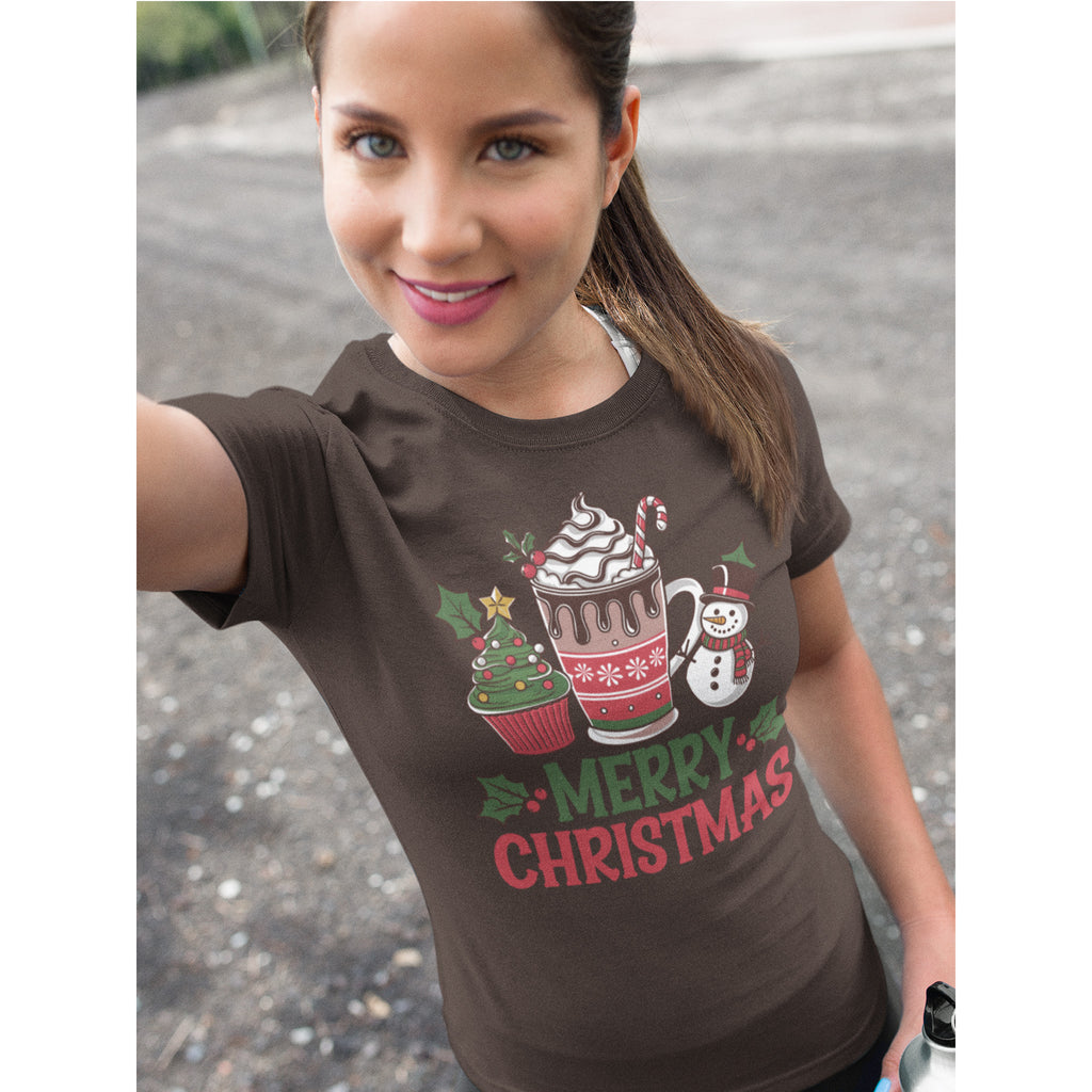Woman wearing a brown t-shirt with Christmas-themed graphics and text.