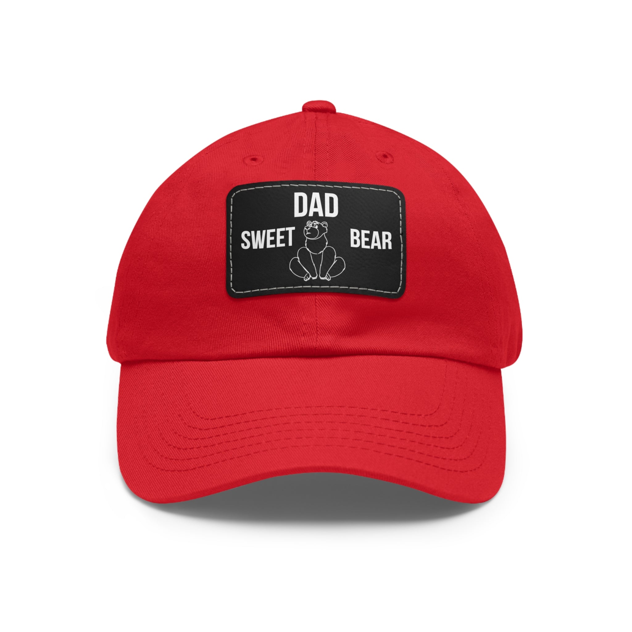Red cap with a black patch featuring 'Dad Sweet Bear' text and bear graphic on a white background